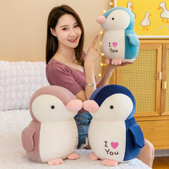Cuddly Penguin Plush Toy in a playful setting image 3
