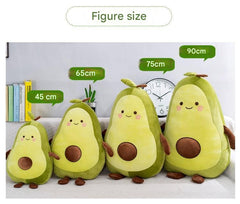Avocado stuffed toy alongside children's books