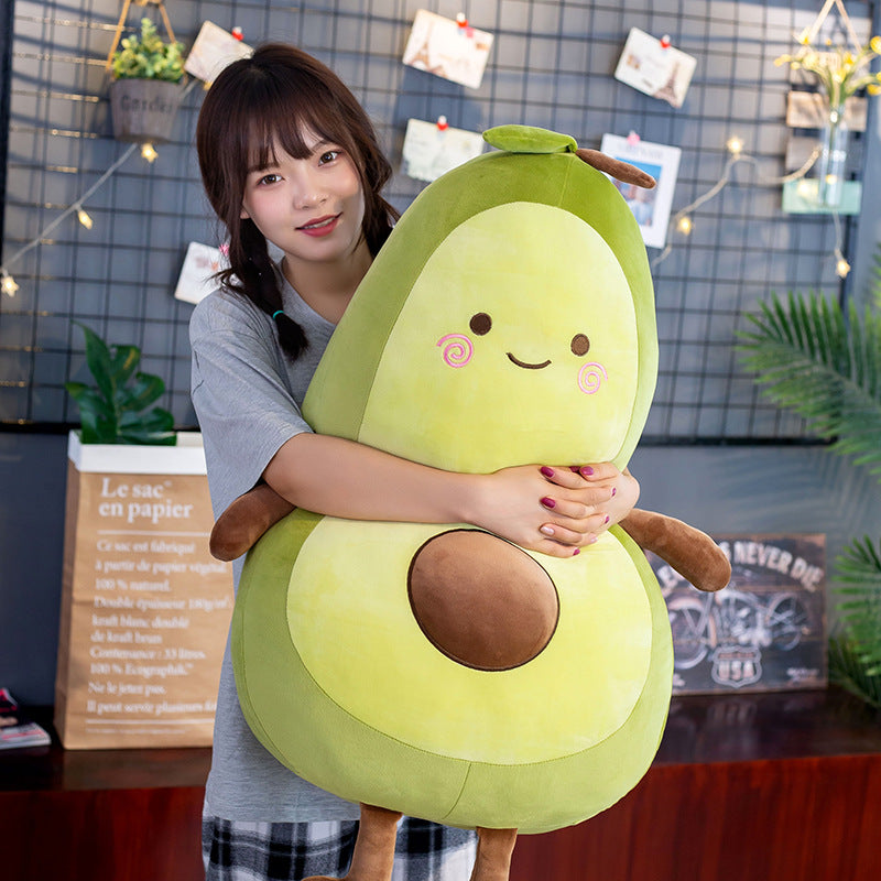 Side view of the cute avocado stuffed animal