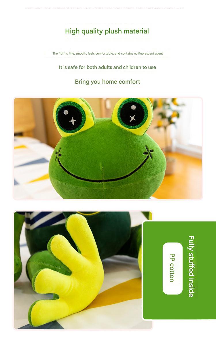 Cuddly green frog plush on a blanket