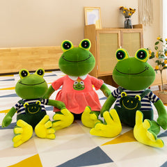 Vibrant green stuffed frog model displayed