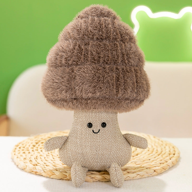 Decorative display featuring succulent and mushroom plush