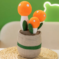 Close up of faux succulent with plush mushroom ornament