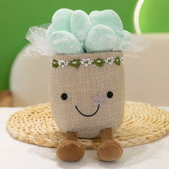 Decorative display featuring succulent and mushroom plush