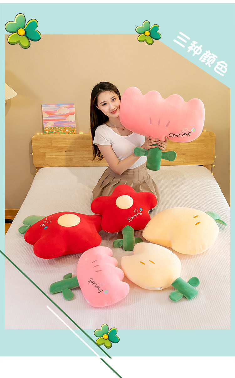 Cute Tulip Plush Pillow being cuddled by a child