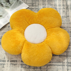 Floral print cushion on sofa