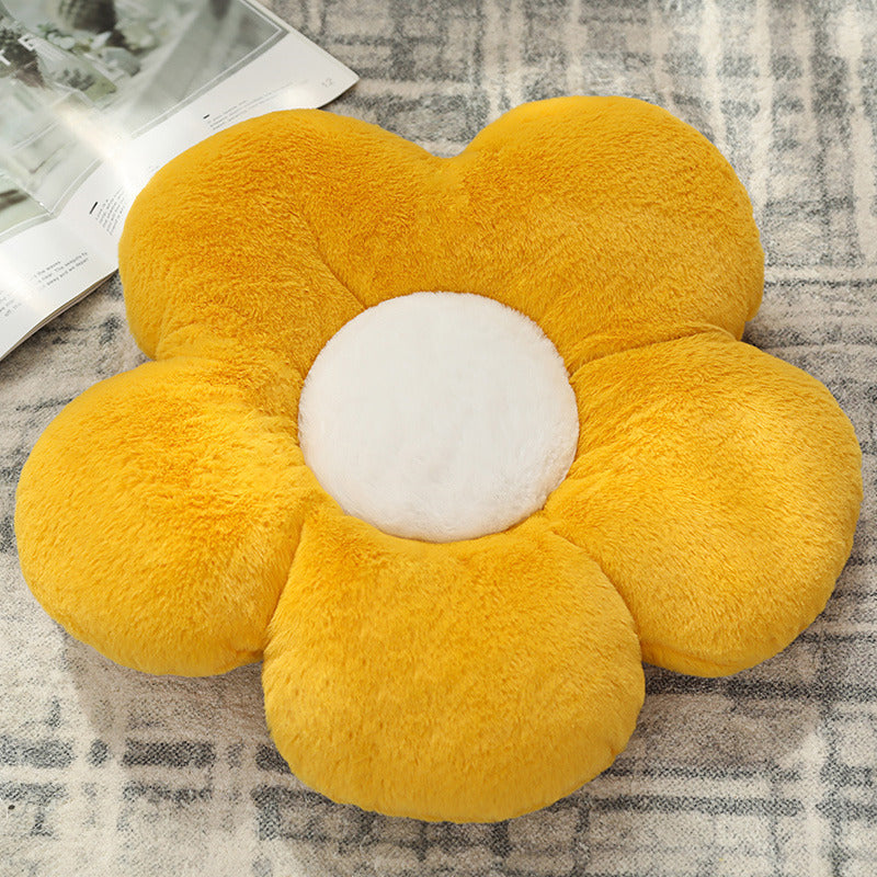 Floral print cushion on sofa