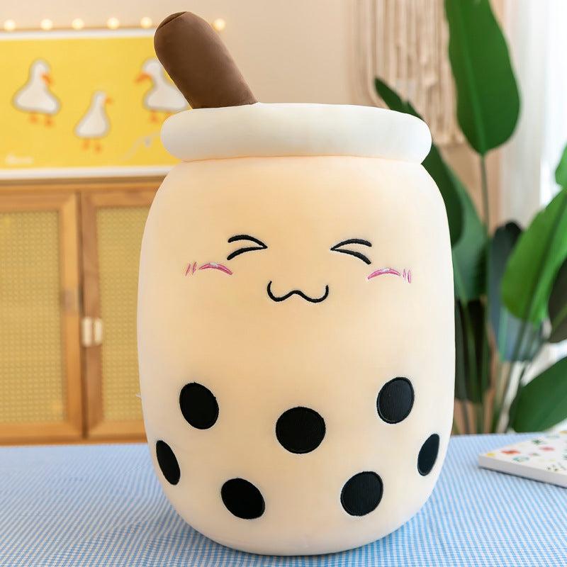 boba tea plush toy on decorative shelf