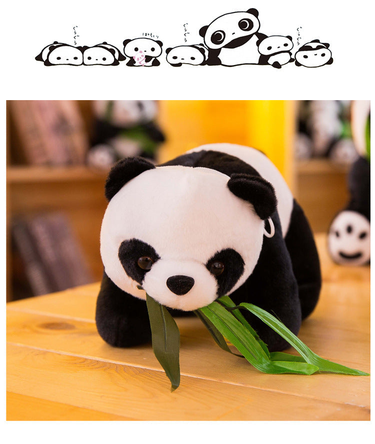 Realistic plush panda on bed
