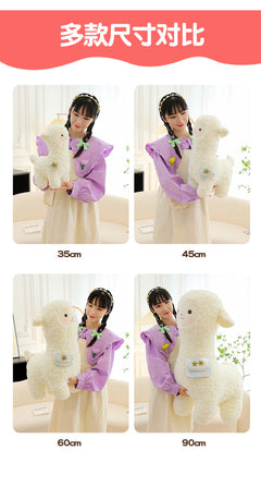 happy child with plush alpaca