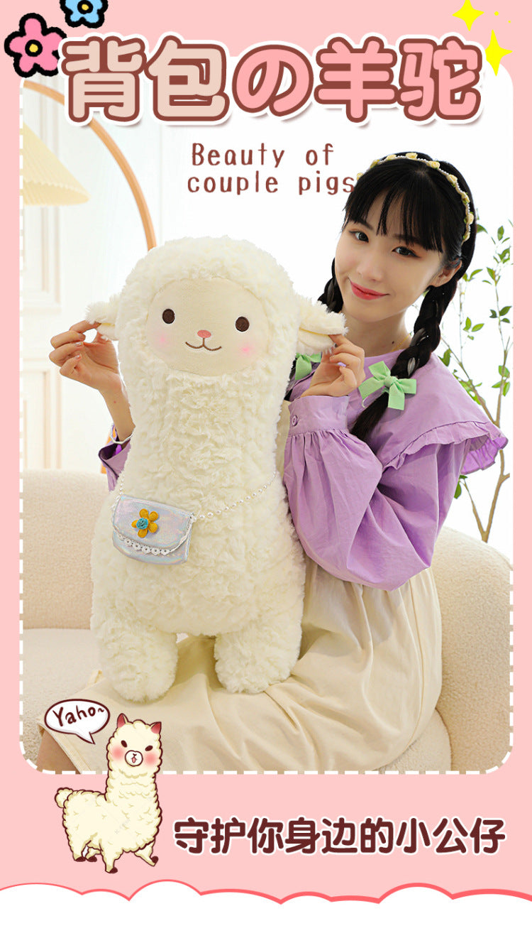 happy child with plush alpaca