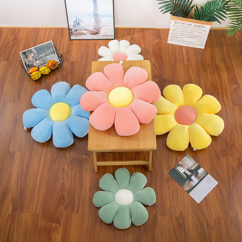 Floral Daisy Cushion Plush Toy on sofa