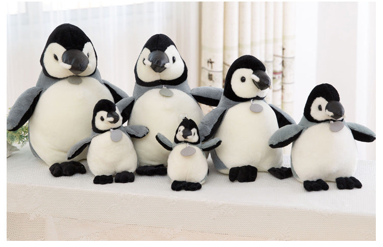 Different angles of Penguin Stuffed Toy