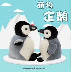 Penguin Doll on a bed with toys