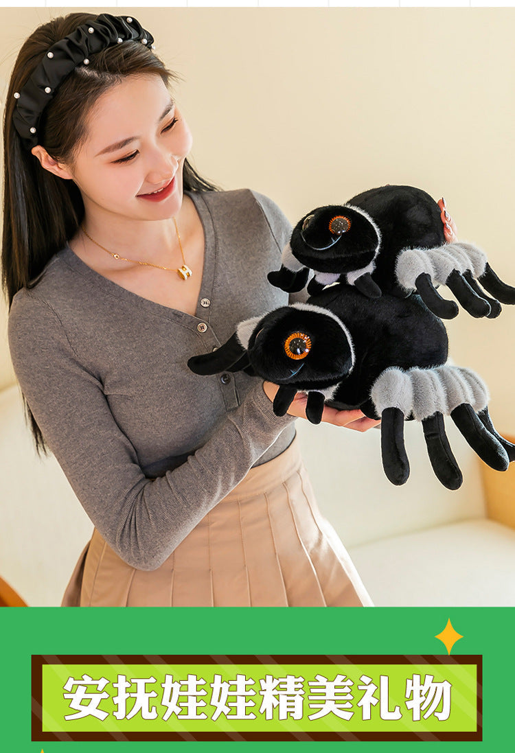 Spider toy beside Halloween decorations for effect