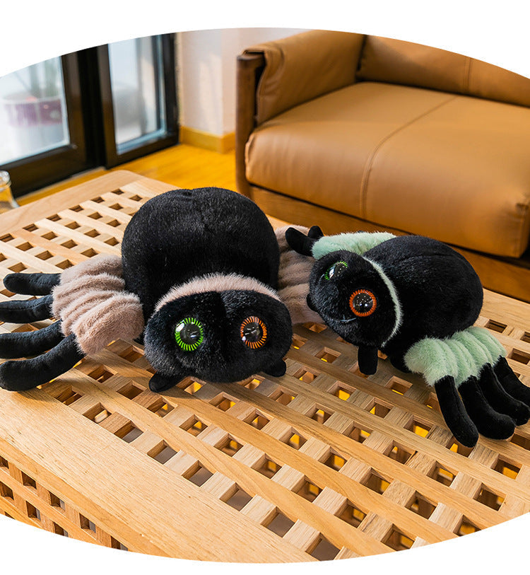 Spider toy beside Halloween decorations for effect