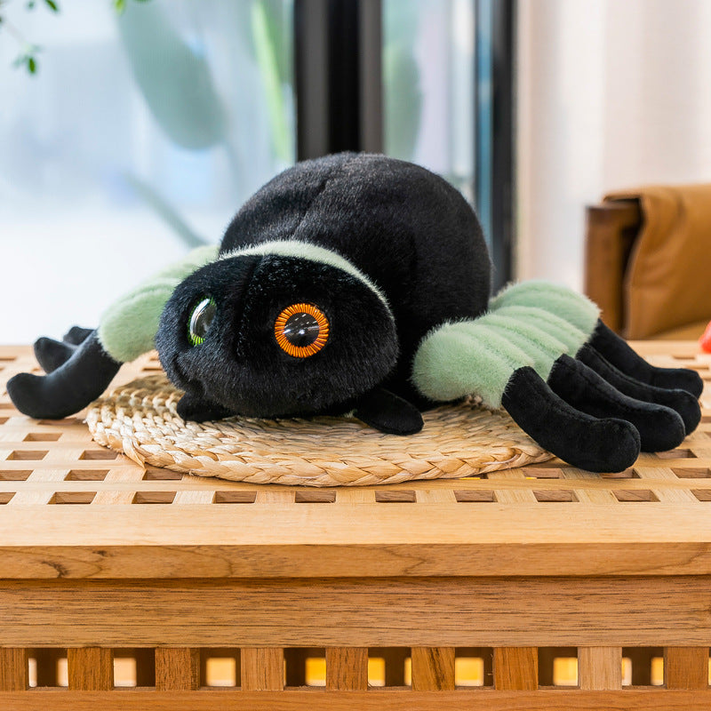Lifelike plush spider on display