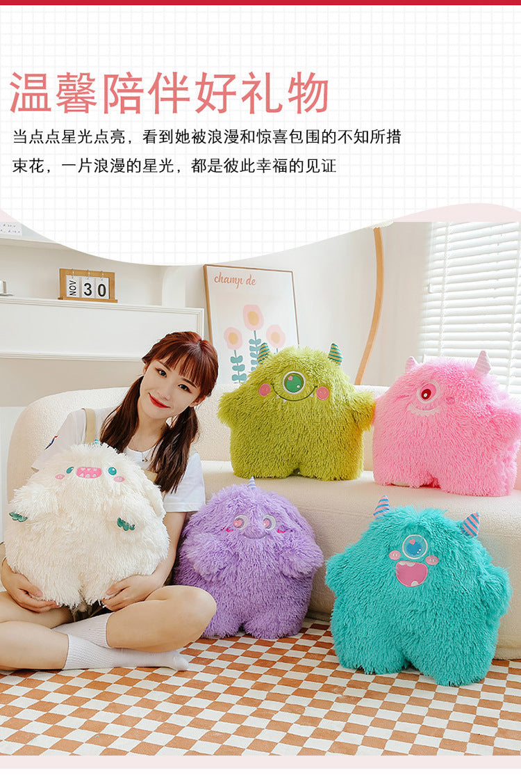 Cute monster plush pillow showing soft texture and charm