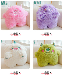 Playful and fun monster plush pillow displayed on a sofa