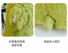 Close-up of cute monster pillow highlighting the plush material