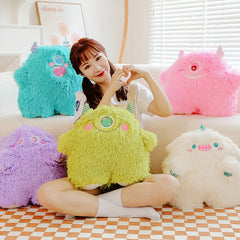 Cute monster plush pillow showing soft texture and charm