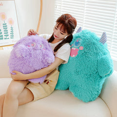 Close-up of cute monster pillow highlighting the plush material