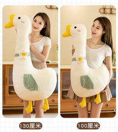 Large plush body pillow in cozy setting