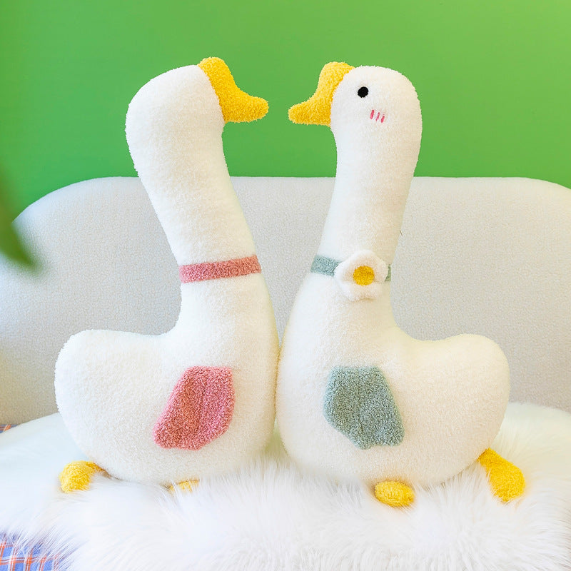 Goose-shaped pillow displaying comfort features