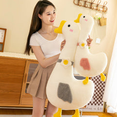 Large plush body pillow in cozy setting