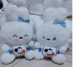 Child playing with plush fruit dolls