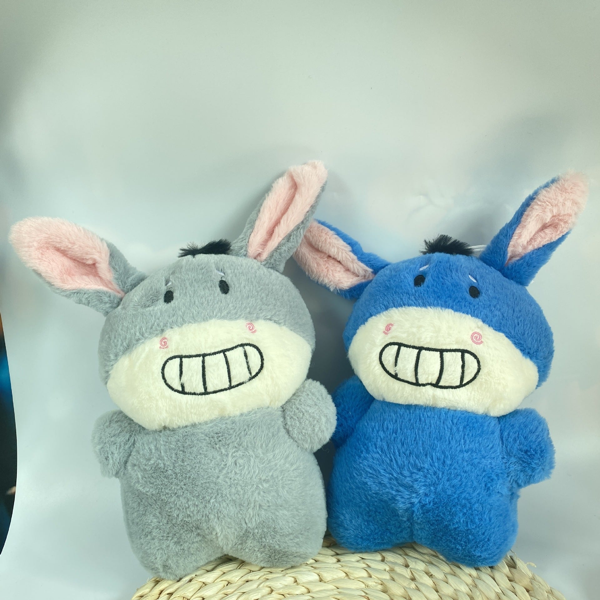 Kids hugging plush fruit dolls