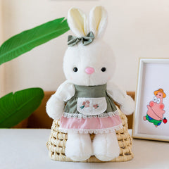 Couple bunny and bear plush toys side by side