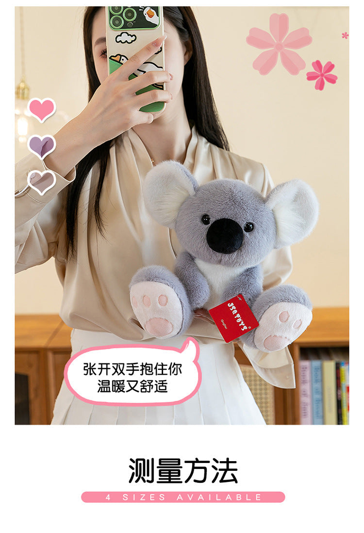Children playing with Panda and Koala plush toys