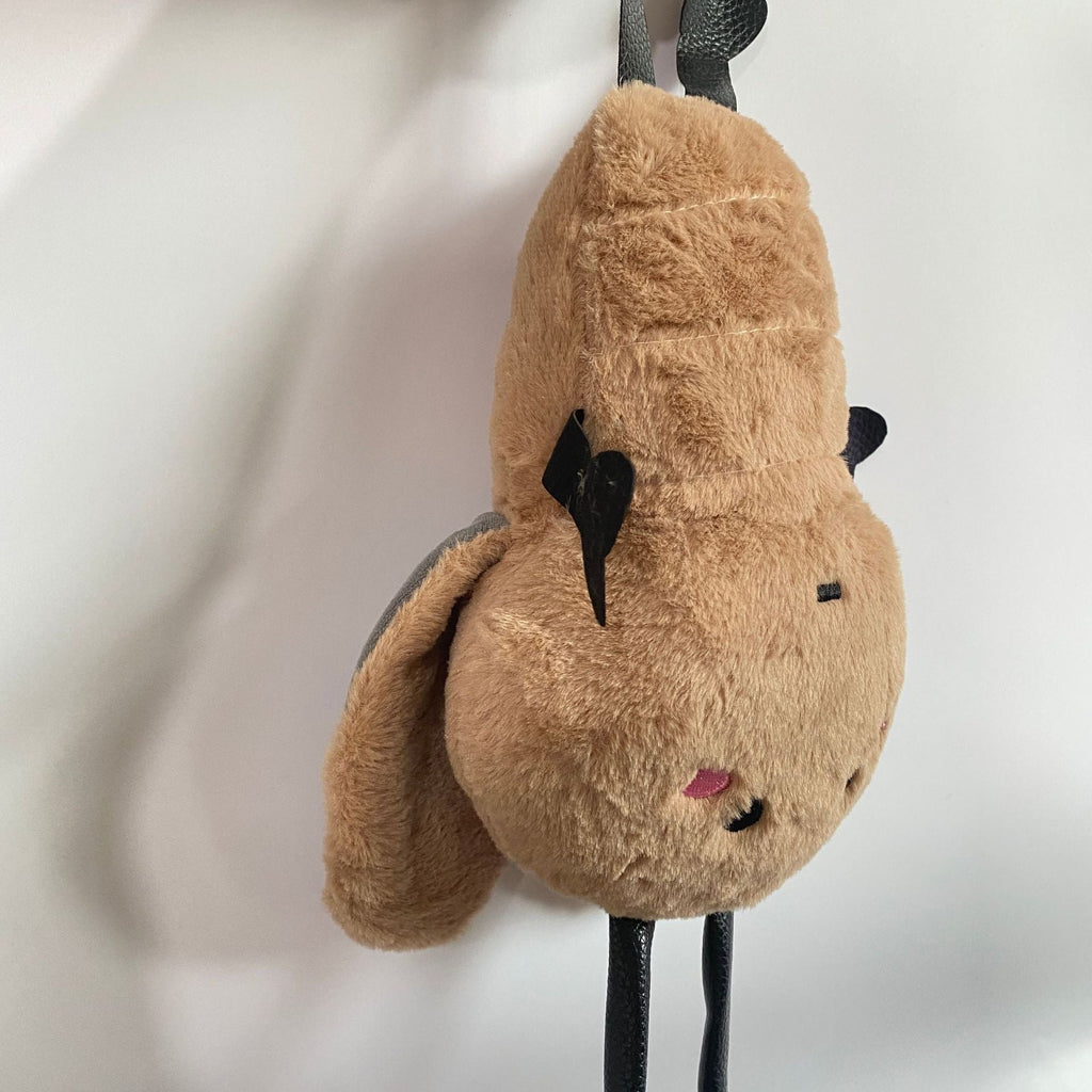 Roach toy with dark brown colour