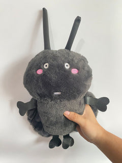 Roach Plush Toy on a colourful background