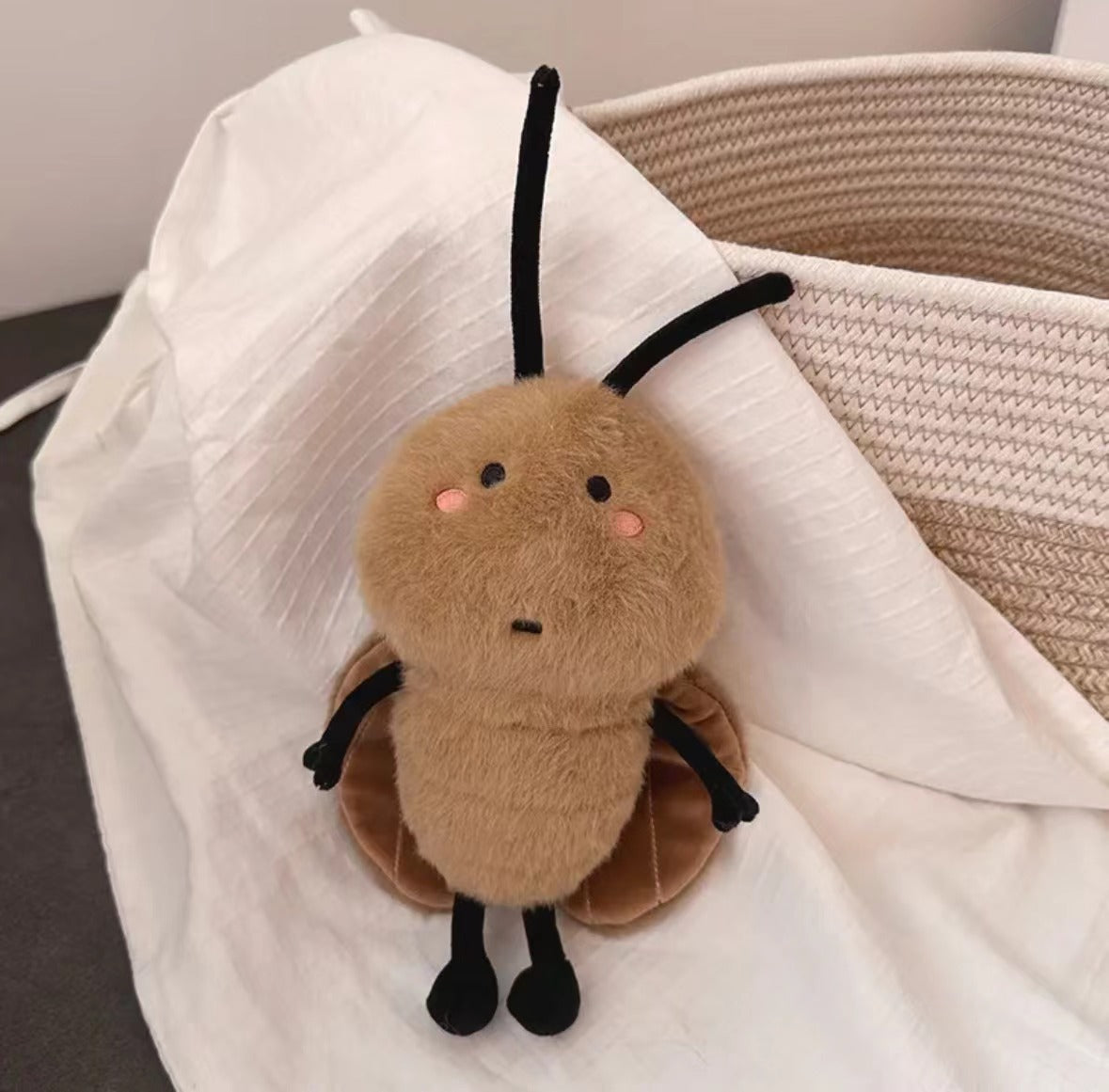Roach toy with dark brown colour