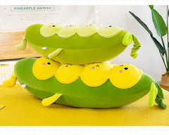 smiling plush caterpillar on display