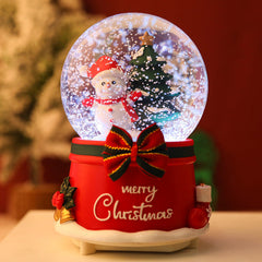 Rotating snow globe featuring holiday decorations