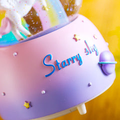Pink unicorn snow globe with music