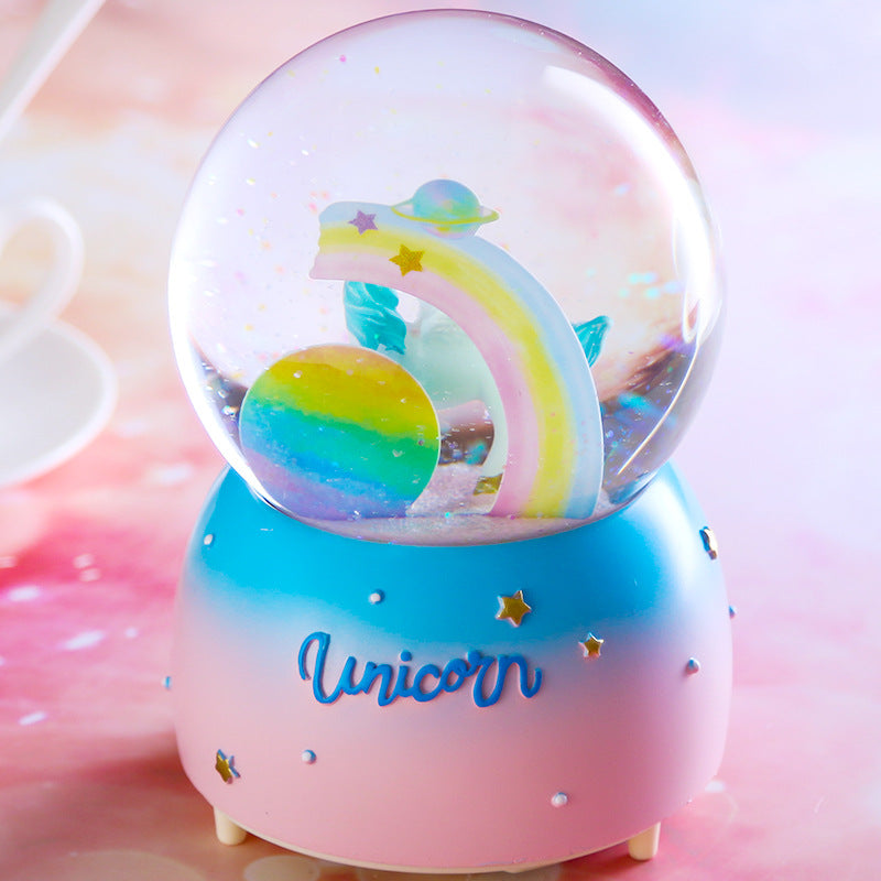 Side view of the unicorn snow globe