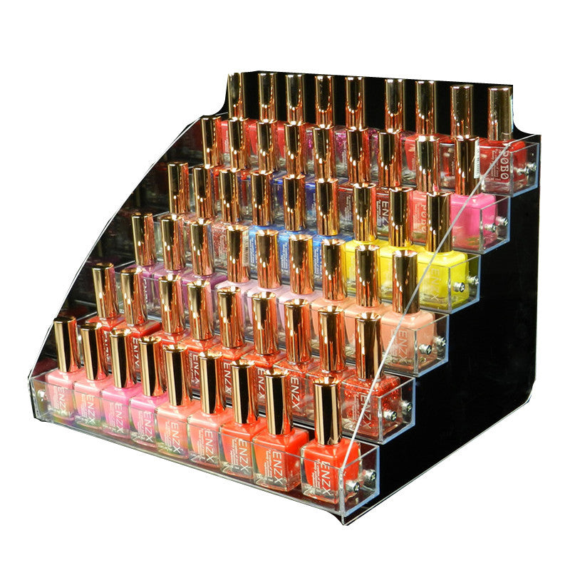 Acrylic nail polish display stand filled with bottles