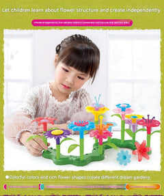 child playing with colourful garden blocks