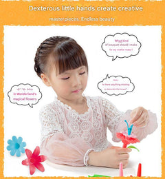child assembling plastic garden blocks