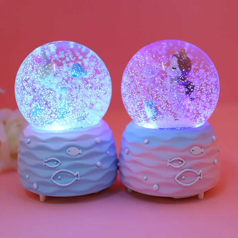 Large version of magical snow globe with automatic snow