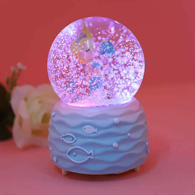Close-up of colourful LED lights in music box