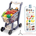 happy child using toy shopping cart outdoors