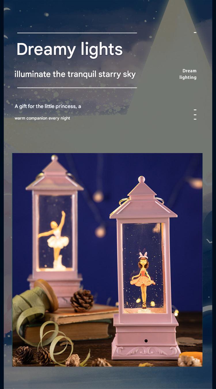 close-up of rotating ballet dancer in snow globe