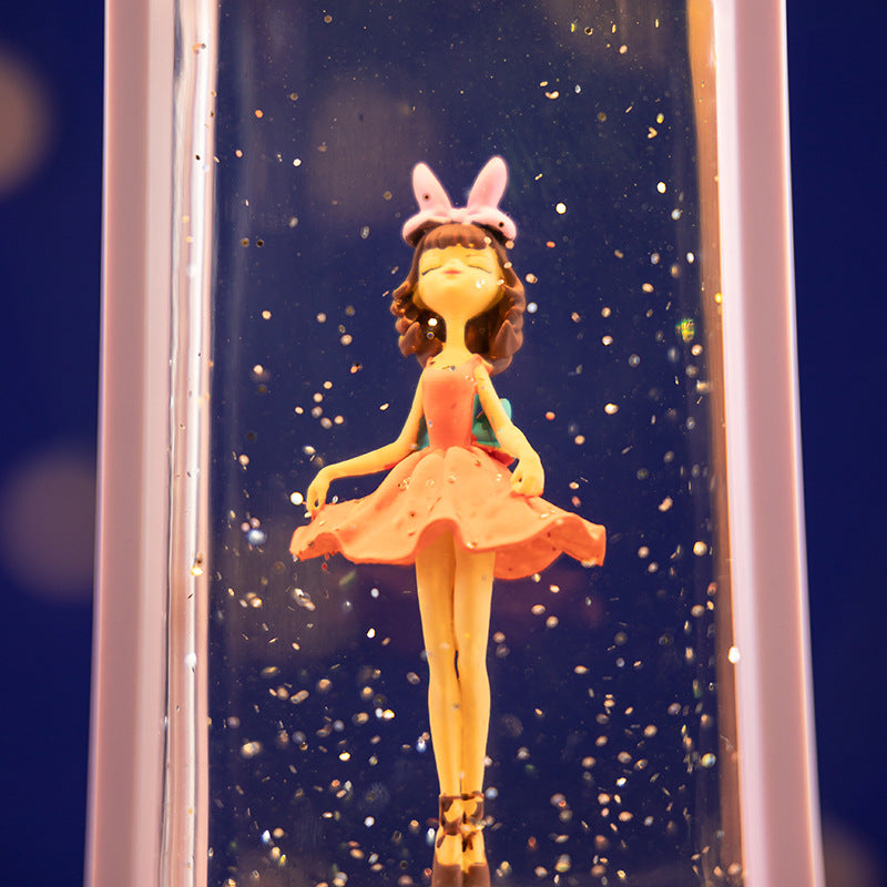 snow globe featuring ballet dancer