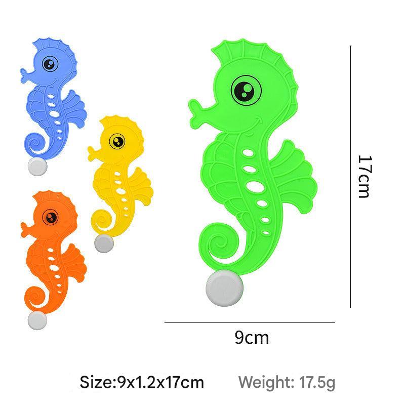 Child diving for toys with colourful fish