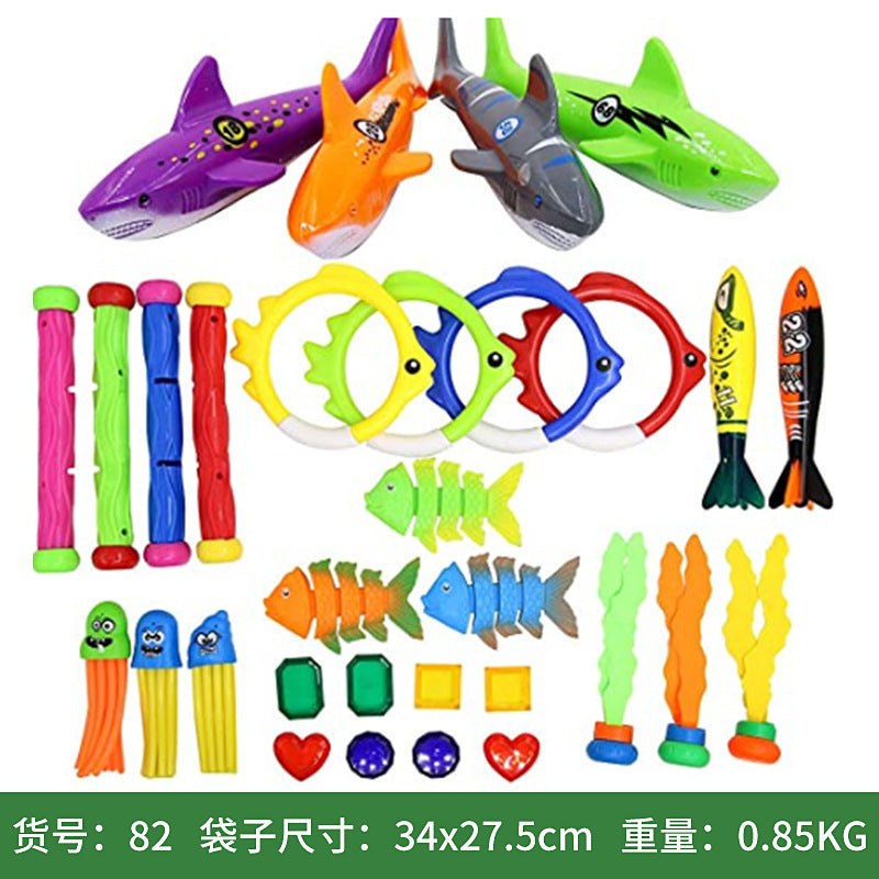 Child diving for toys with colourful fish